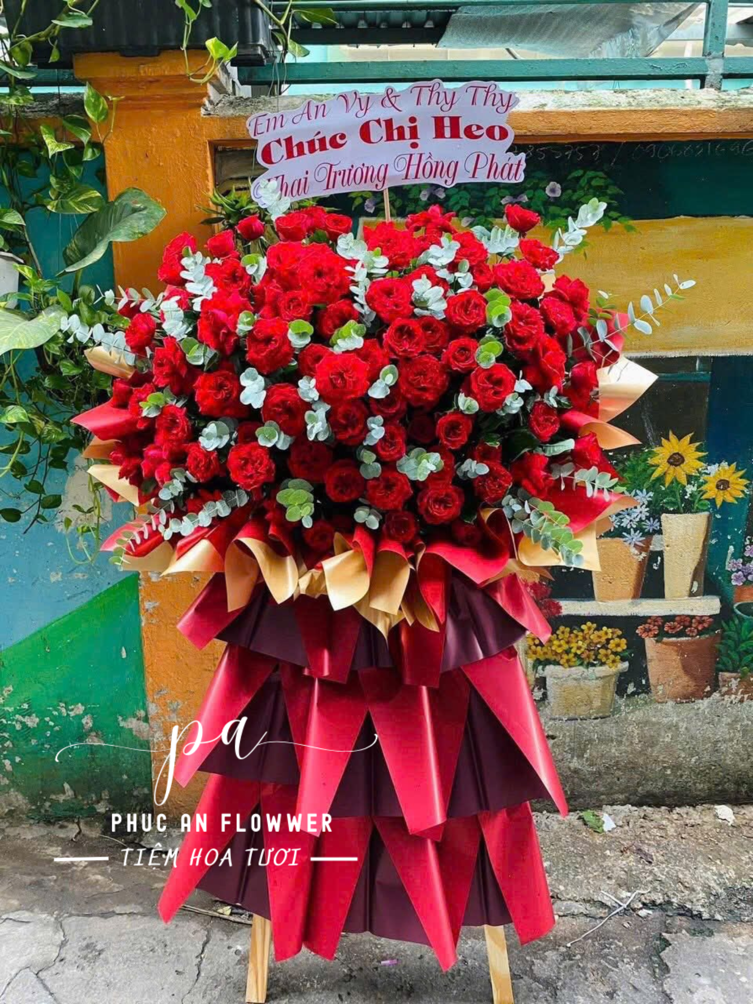 kệ hoa khai trương tông đỏ cao cấp - Hoa Tươi Phúc An