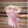 bó hoa đồng tiền hồng pastel nhẹ nhàng